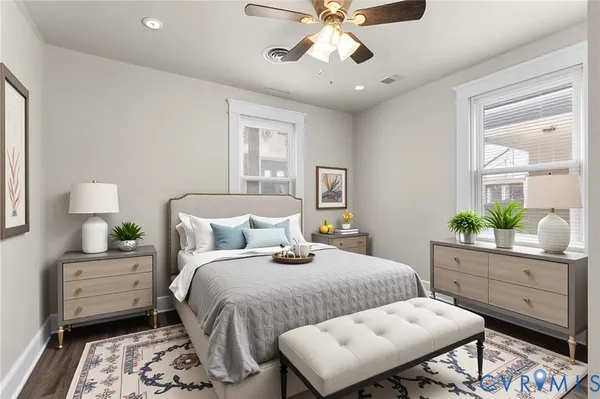 a bedroom with a bed and a dresser