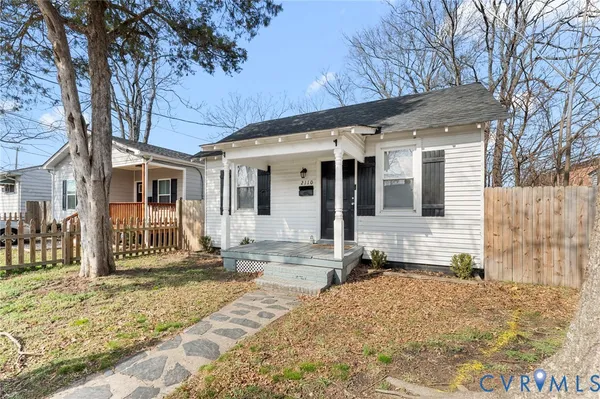 a front view of a house with a porch