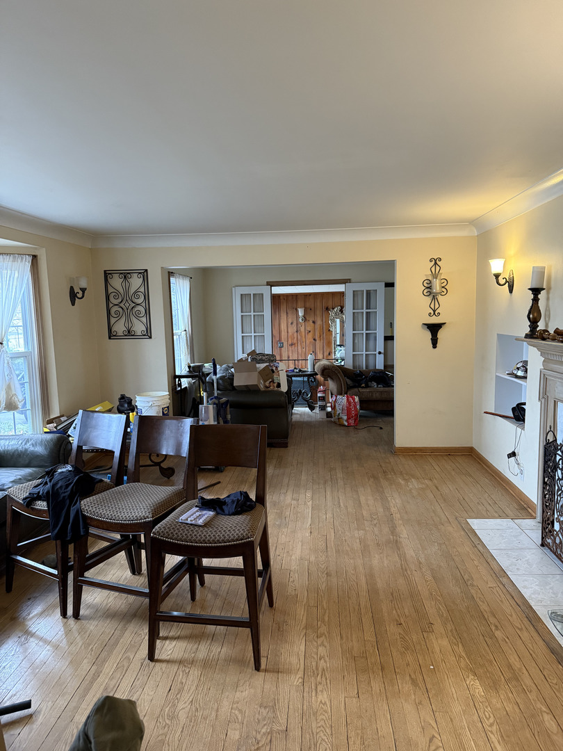 4N542 Church Road Bensenville, IL 60106 - Photo 2 of 6 a living room with furniture and a wooden floor