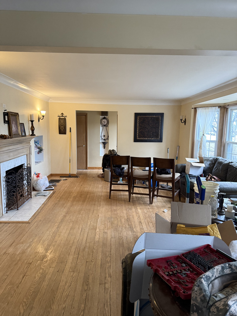 4N542 Church Road Bensenville, IL 60106 - Photo 3 of 6 a living room with furniture and a fireplace