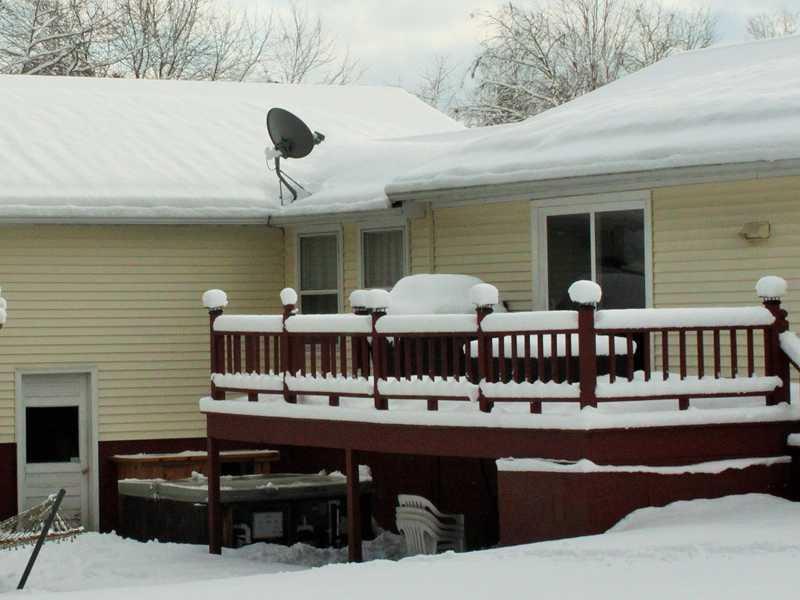3 Allenson Street Springvale, ME 04083 - Photo 22 of 24 Patio/Deck. Private Back Deck & Hot Tub