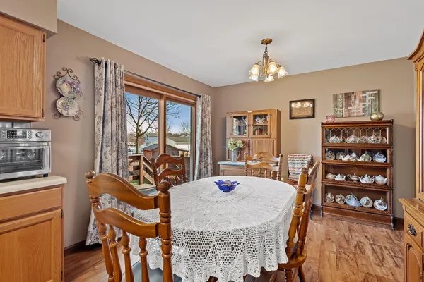 a view of a dining room with furniture window and outside view
