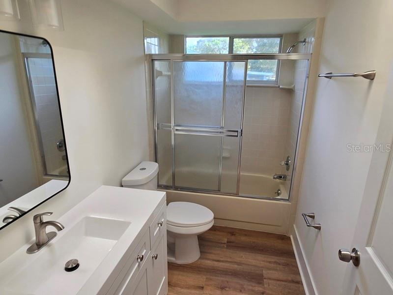11510 Southwest 85th Court Ocala, FL 34481 - Photo 25 of 39 a bathroom with a sink a toilet and shower