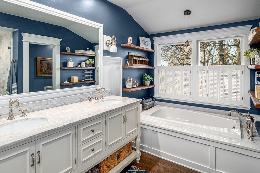 3 Cricket Circle Scituate, MA 02066 - Photo 21 of 42 a bathroom with a granite countertop sink mirror and bathtub