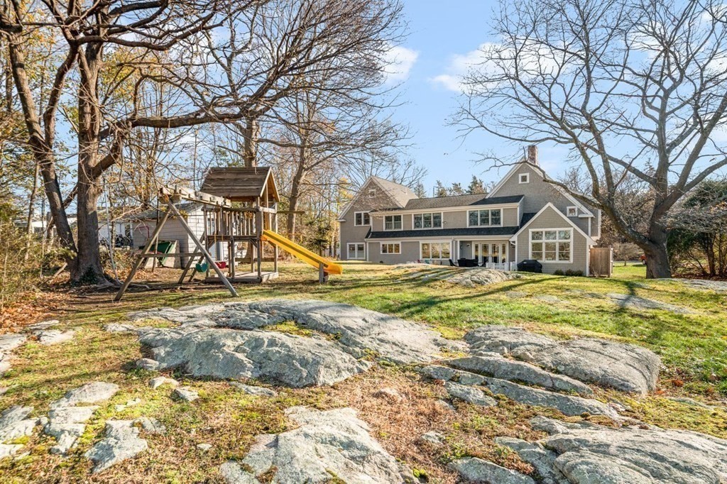 3 Cricket Circle Scituate, MA 02066 - Photo 36 of 42 a view of a house with snow on the tree
