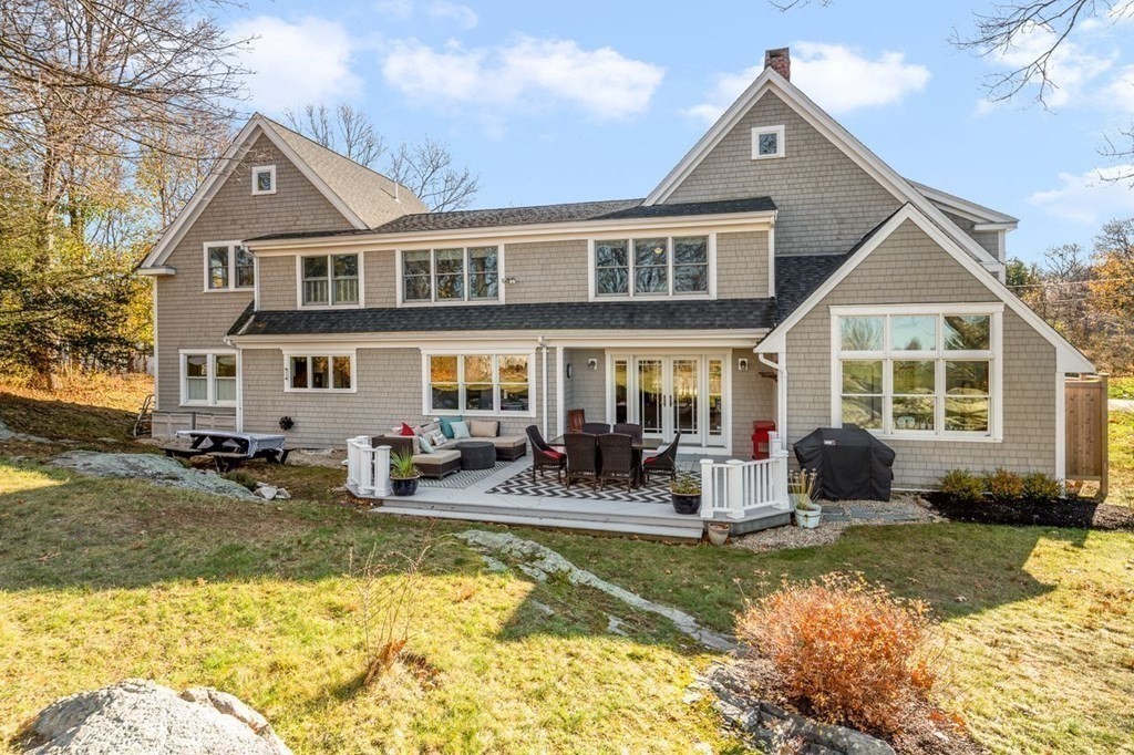 3 Cricket Circle Scituate, MA 02066 - Photo 39 of 42 a front view of a house with swimming pool having outdoor seating