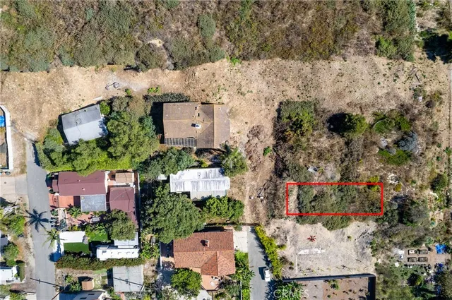 an aerial view of a houses with outdoor space