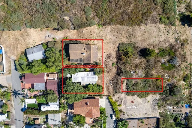 an aerial view of a houses with outdoor space