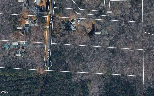 a bathroom with a window and a shower