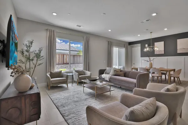 a living room with furniture and a couch