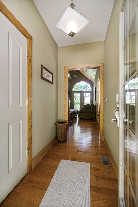 405 Rocky Top Road Sparta, TN 38583 - Photo 4 of 41 a view of a hallway view with wooden floor and a living room