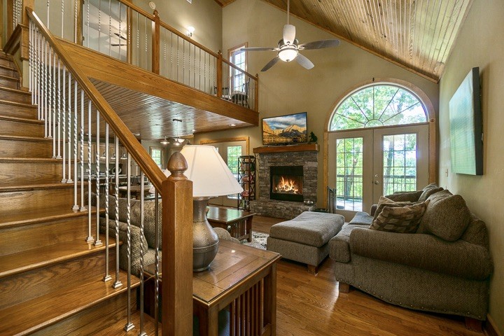405 Rocky Top Road Sparta, TN 38583 - Photo 5 of 41 a living room with fireplace furniture and a large window
