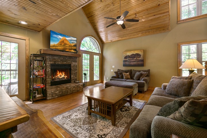405 Rocky Top Road Sparta, TN 38583 - Photo 8 of 41 a living room with furniture and a fireplace