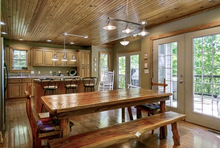 405 Rocky Top Road Sparta, TN 38583 - Photo 9 of 41 a view of a dining room with furniture window and wooden floor