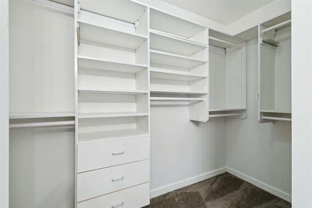 3015 Bryan Street, Unit 3B Dallas, TX 75204 - Photo 13 of 19 a view of walk in closet with empty racks