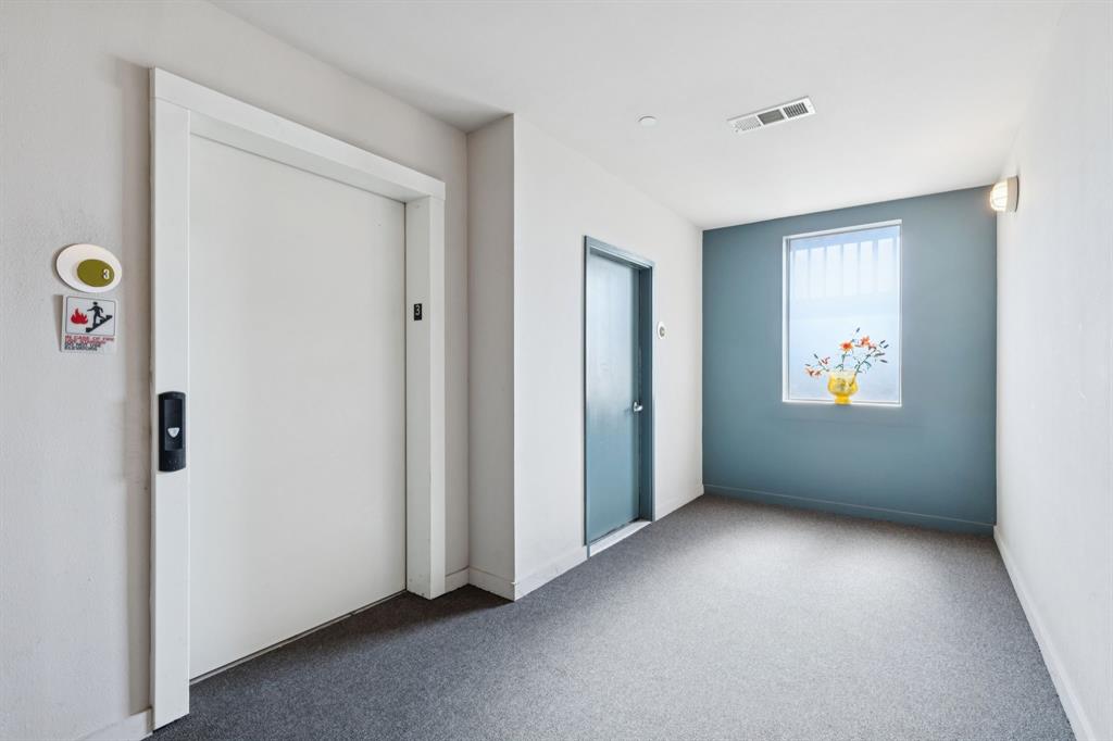 3015 Bryan Street, Unit 3B Dallas, TX 75204 - Photo 16 of 19 a view of an empty room