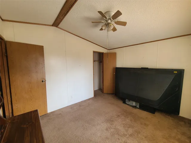 a view of a livingroom with a flat screen tv