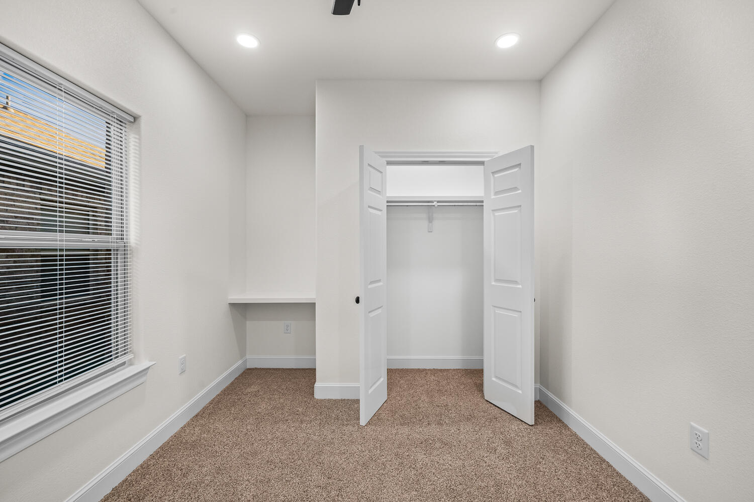 6923 17th Street Lubbock, TX 79416 - Photo 29 of 34 a view of an empty room with a window