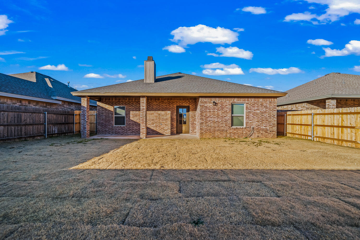 6923 17th Street Lubbock, TX 79416 - Photo 33 of 34 a view of a house with a snow