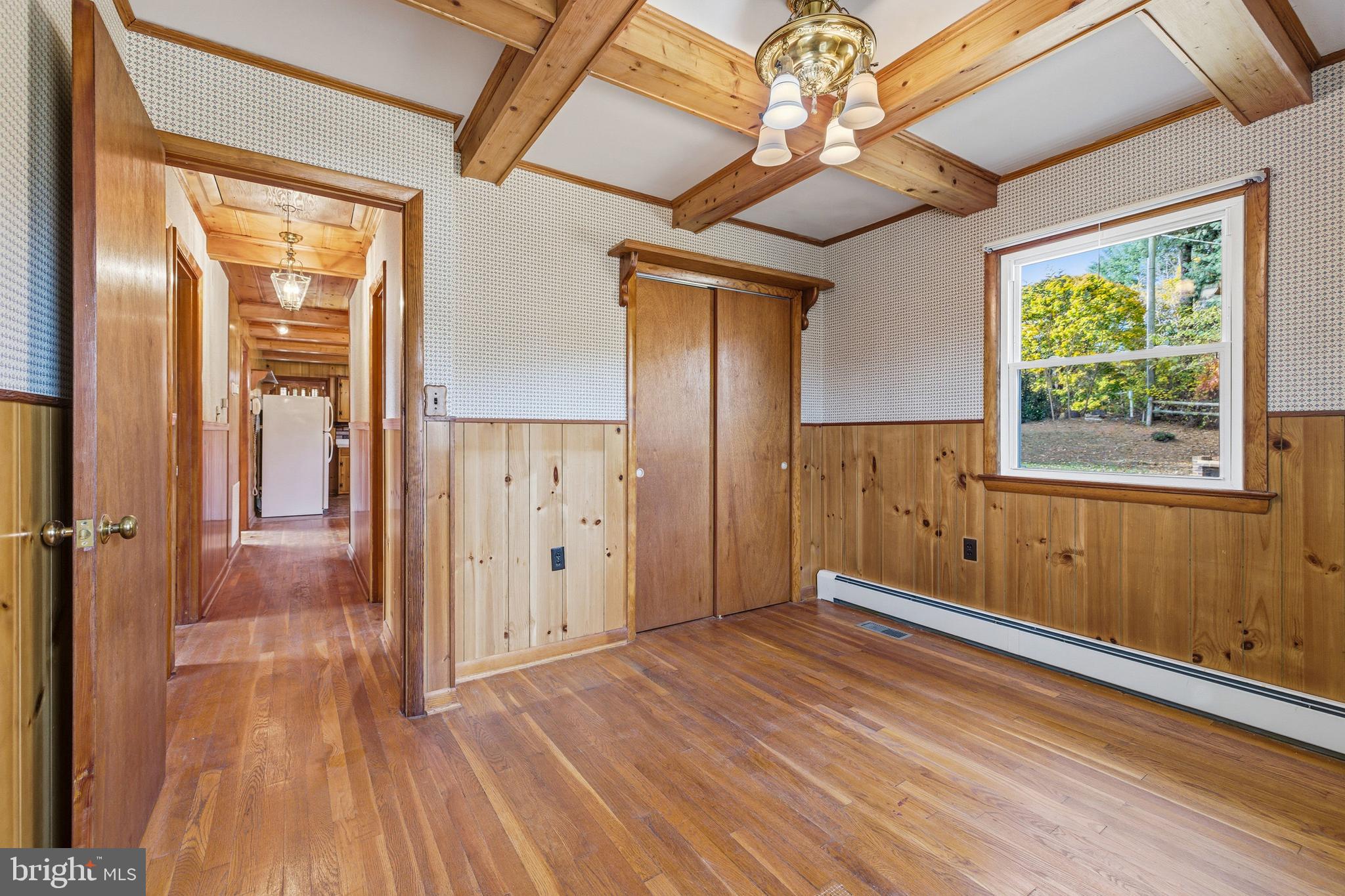 27 Atkins Road Sperryville, VA 22740 - Photo 24 of 76 a view of empty room with wooden floor and fan