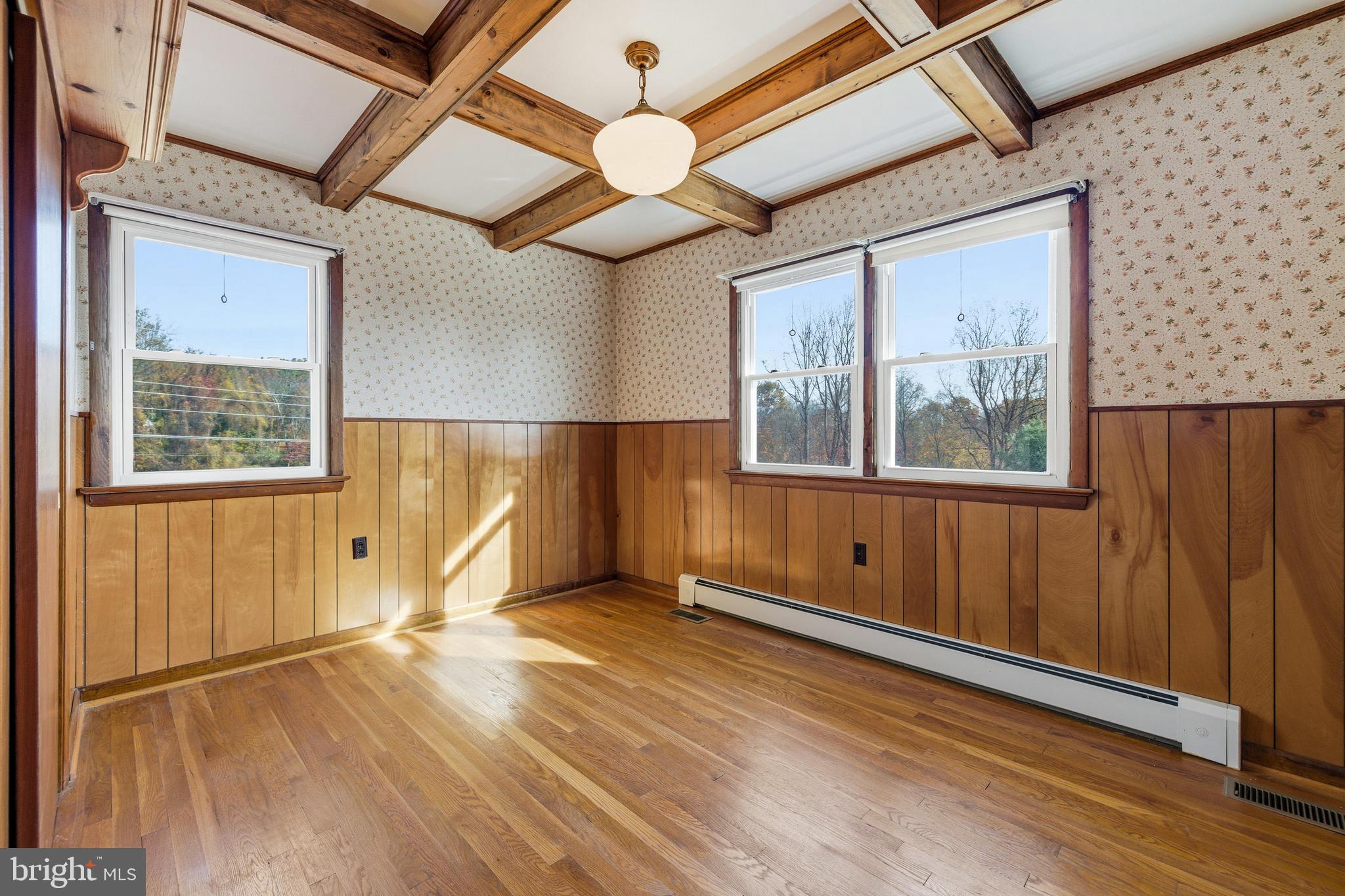 27 Atkins Road Sperryville, VA 22740 - Photo 27 of 76 a view of empty room with wooden floor and fan