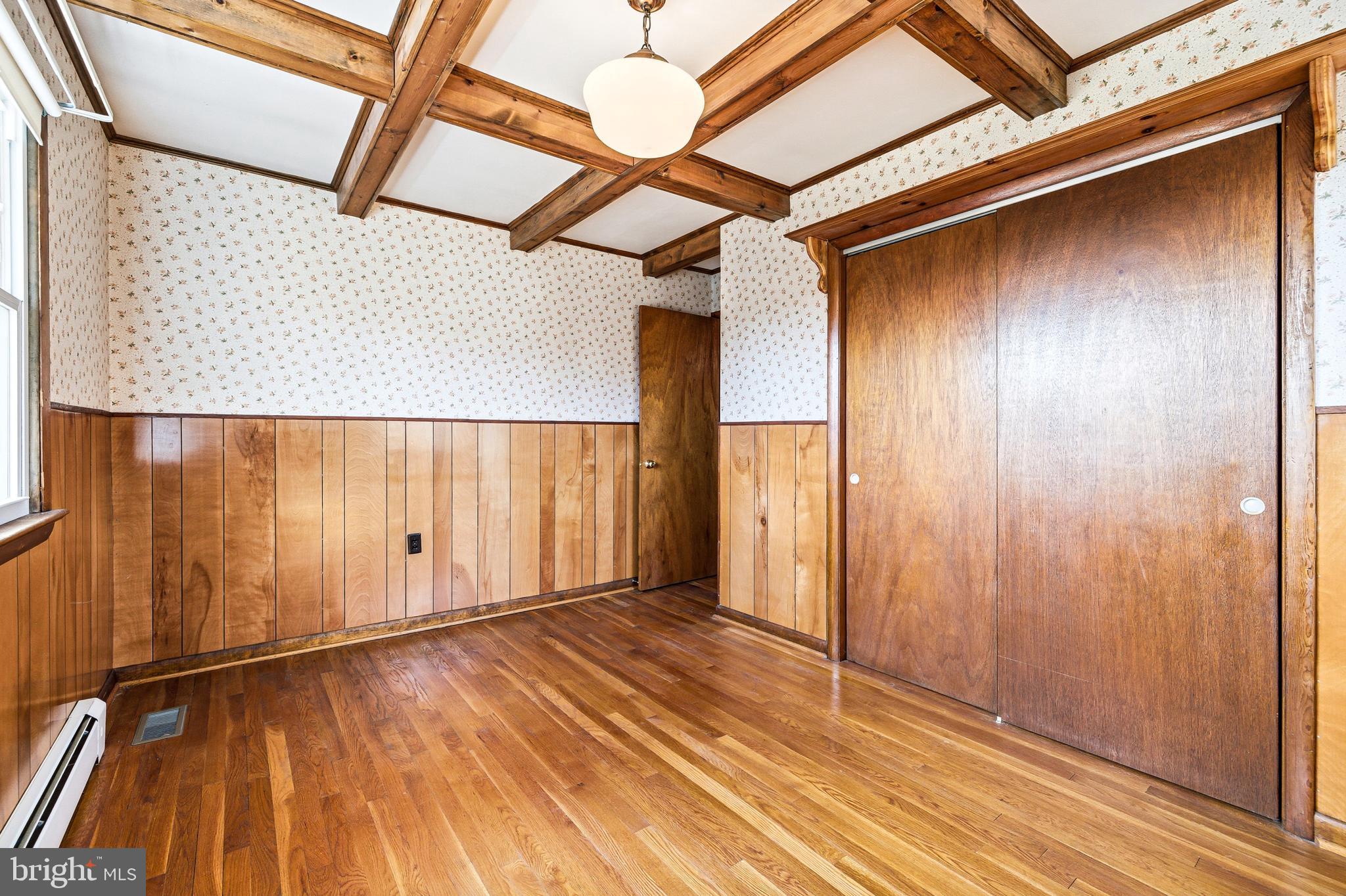 27 Atkins Road Sperryville, VA 22740 - Photo 29 of 76 a view of an empty room with wooden floor