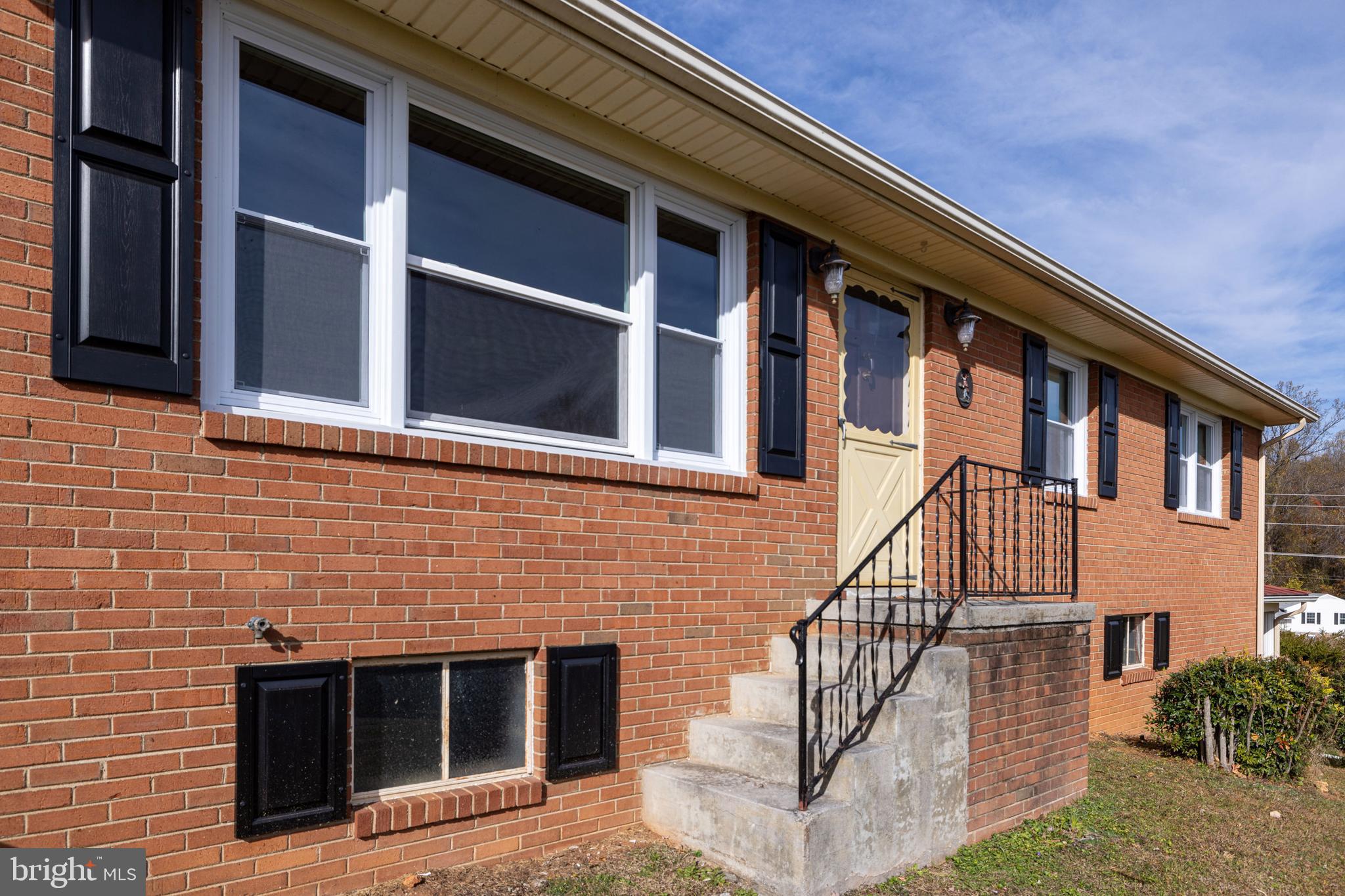 27 Atkins Road Sperryville, VA 22740 - Photo 45 of 76 a front view of a house with stairs