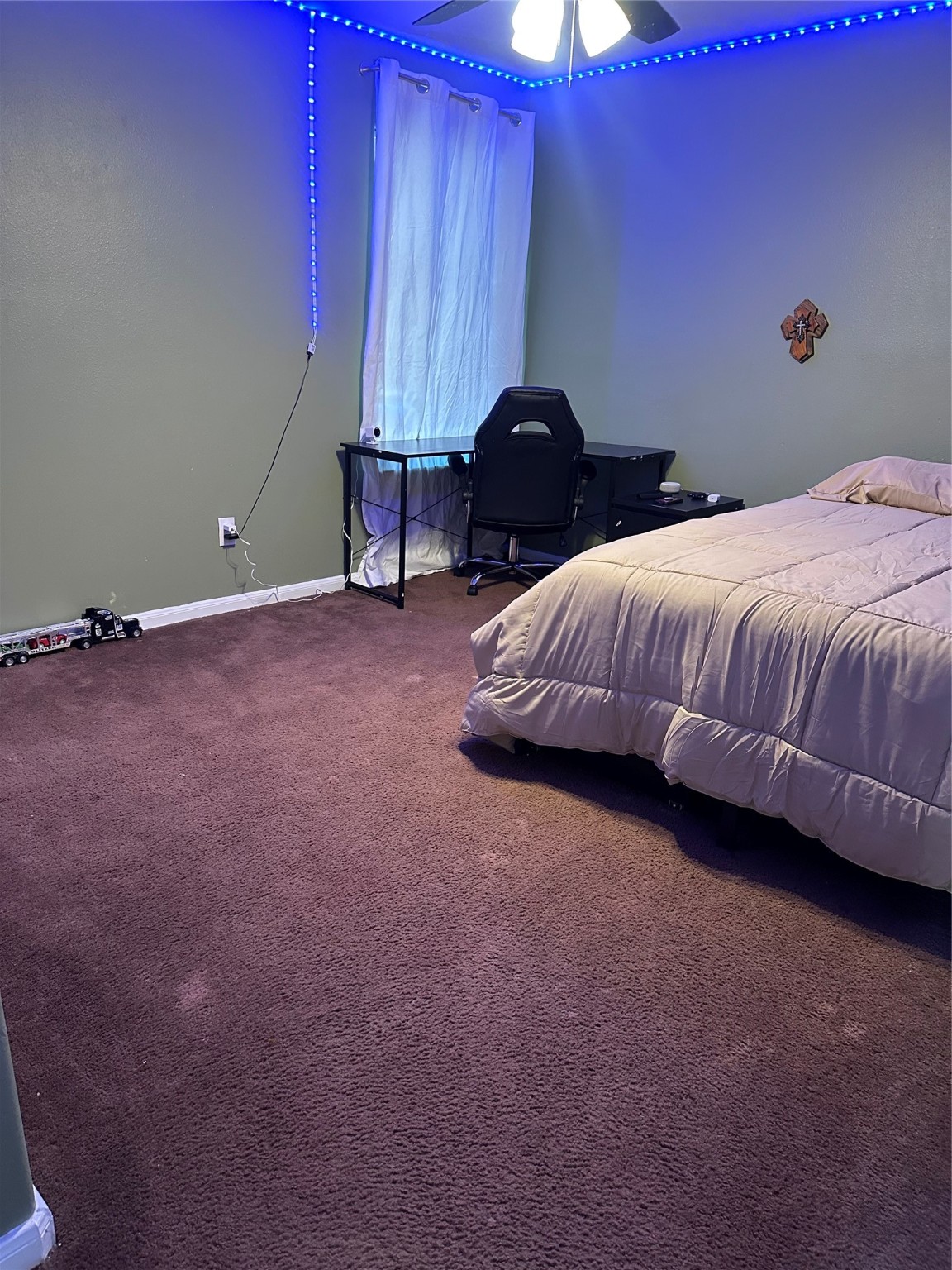 13215 Crim Road Houston, TX 77049 - Photo 16 of 20 a bedroom with a bed and painted walls