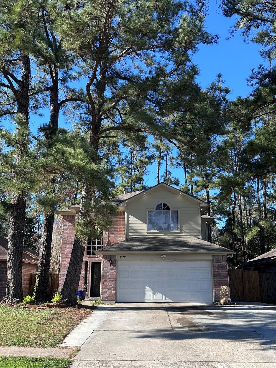 13215 Crim Road Houston, TX 77049 - Photo 20 of 20 a view of a house with a yard and tree s