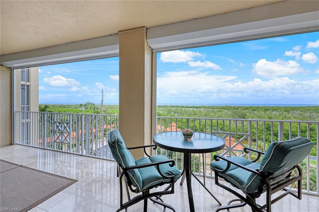 6597 Nicholas Boulevard, Unit 705 Naples, FL 34108 - Photo 25 of 34 a view of a dining room with furniture window and outside view