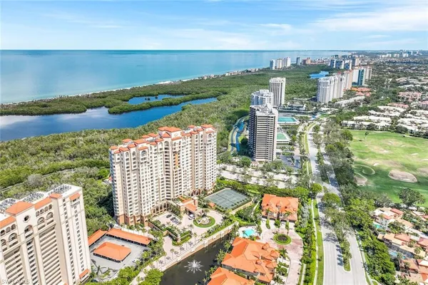 a view of city with ocean