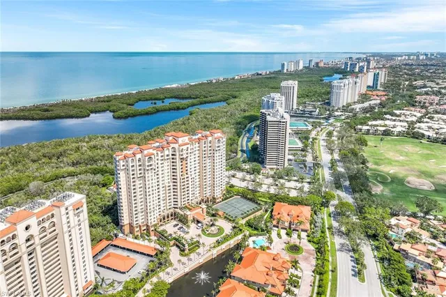 a view of city with ocean