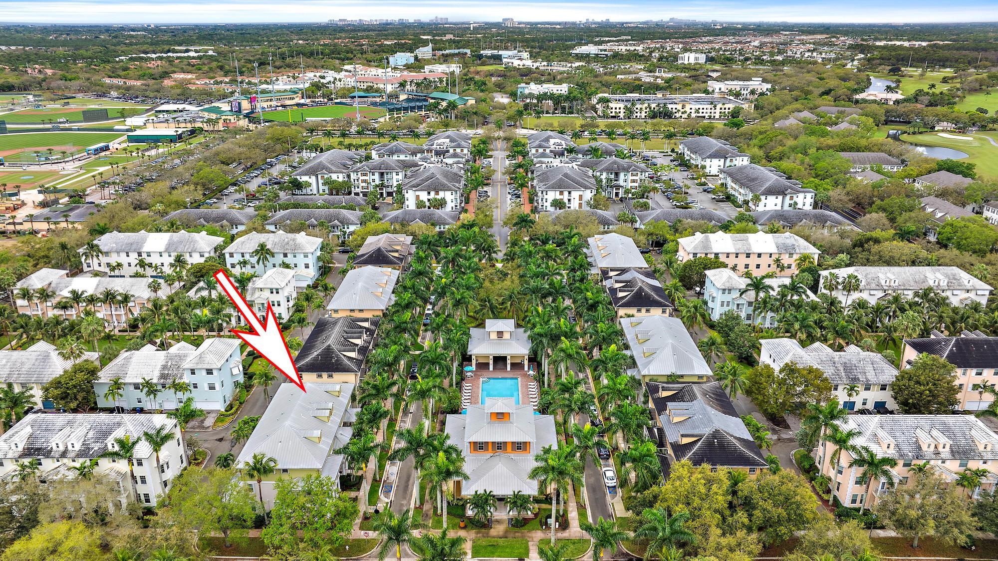 4237 East Main Street Jupiter, FL 33458 - Photo 18 of 21 an aerial view of residential building with parking