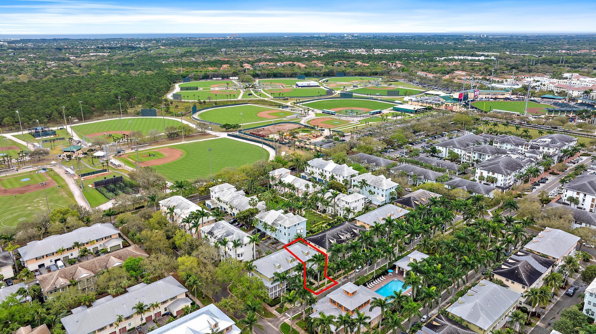 4237 East Main Street Jupiter, FL 33458 - Photo 3 of 21 an aerial view of a residential houses with outdoor space