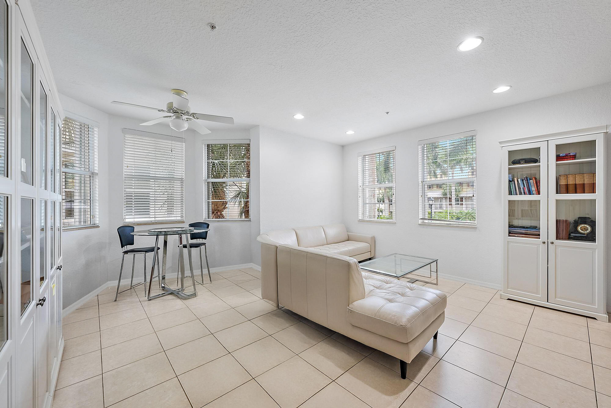 4237 East Main Street Jupiter, FL 33458 - Photo 6 of 21 a living room with furniture and a table