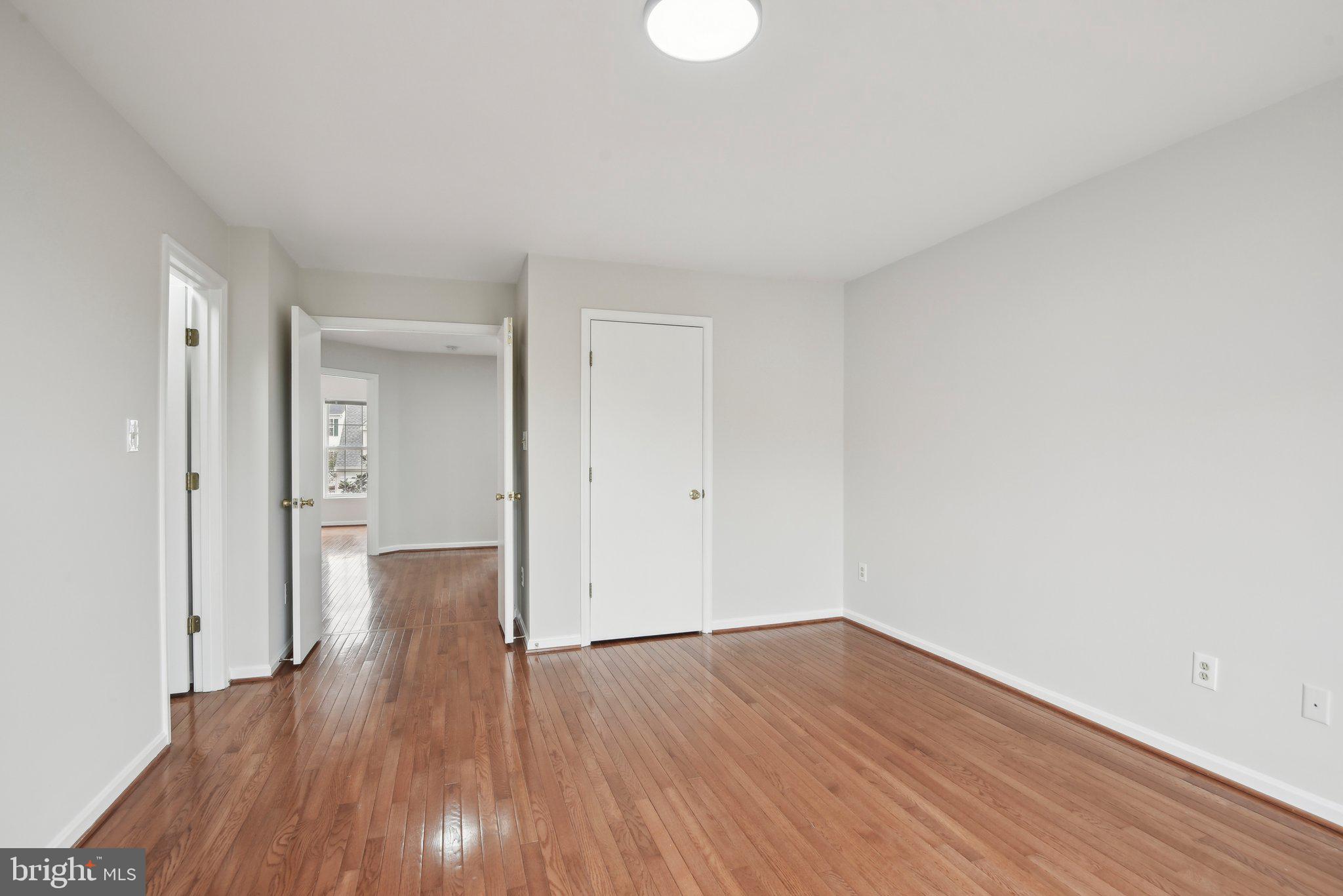14206 Brenham Drive Centreville, VA 20121 - Photo 26 of 68 a big room with wooden floor and natural light