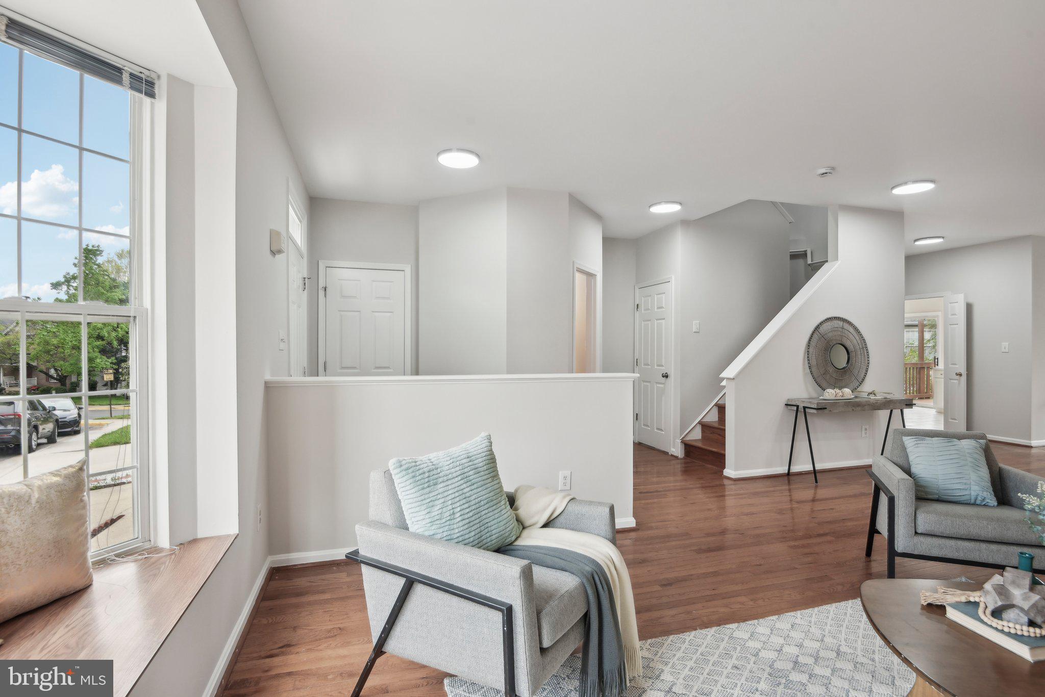 14206 Brenham Drive Centreville, VA 20121 - Photo 9 of 68 a living room with furniture and wooden floor