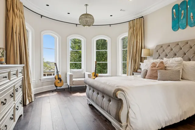 a kitchen with stainless steel appliances a sink stove and refrigerator