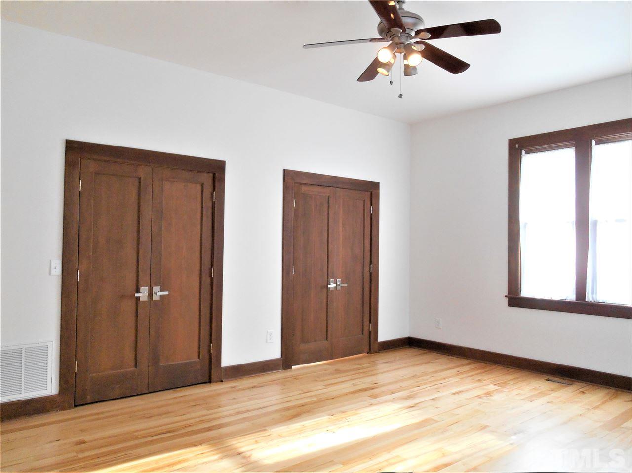 515 Euclid Street Raleigh, NC 27604 - Photo 11 of 24 View toward doors to closet and bath. There are many windows. Curtains are available for your use.