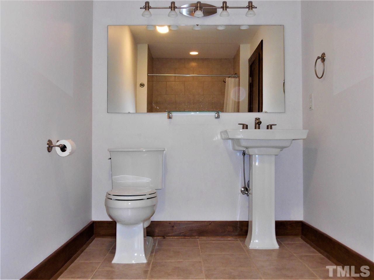 515 Euclid Street Raleigh, NC 27604 - Photo 18 of 24 This bath has a soaking tub with shower. All baths have tiled floors and bath enclosures.