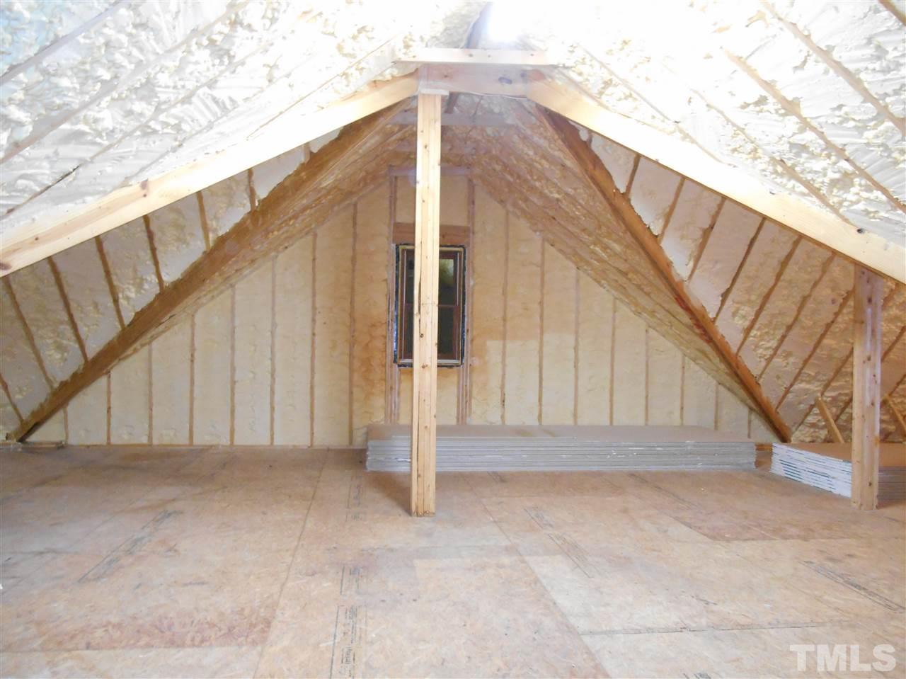515 Euclid Street Raleigh, NC 27604 - Photo 20 of 24 This is a portion of the large, east attic. It is a walk on from the upper bedroom. It is roughed in for all mechanical and sheetrock is stored so no need to purchase and haul up. At least 300 sf for another bedroom suite or living room/kitchen.
