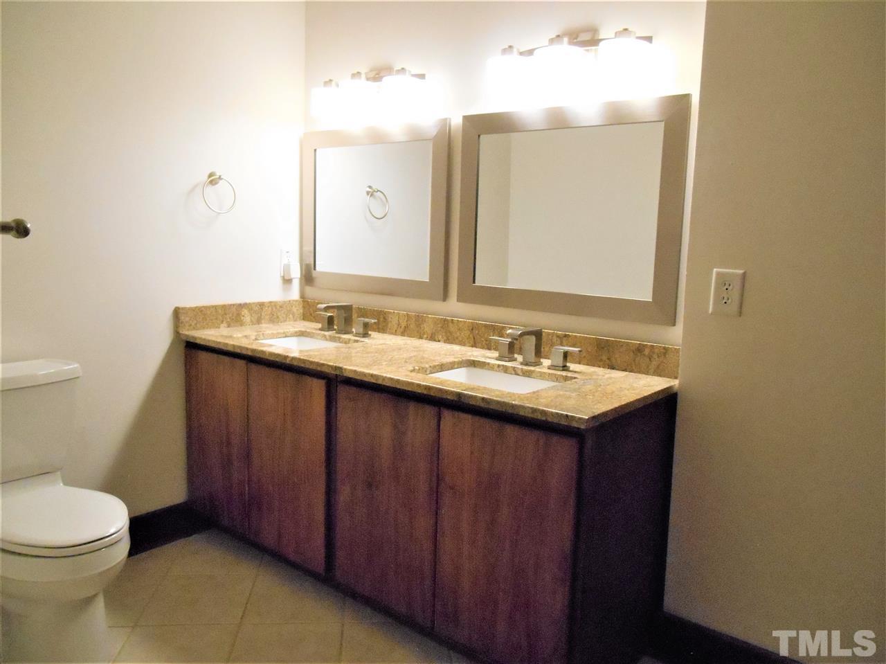 515 Euclid Street Raleigh, NC 27604 - Photo 10 of 24 This bath serves the second bedroom and is adjacent to it. Both are on a short hall, which could be closed off for privacy and quiet.