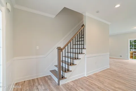 a view of entryway with wooden floor