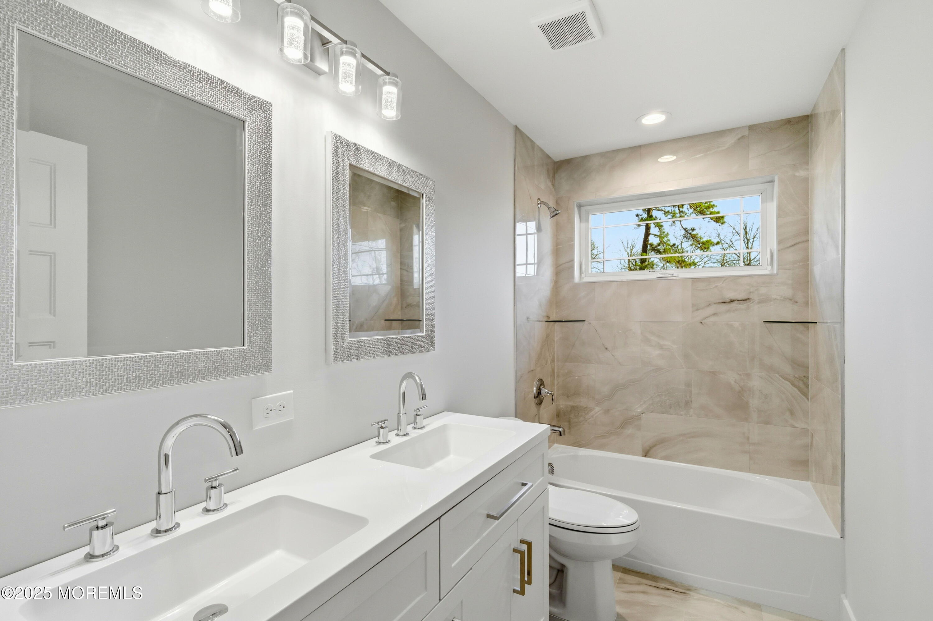 421 Roland Avenue Bayville, NJ 08721 - Photo 23 of 45 a bathroom with a sink a toilet and shower