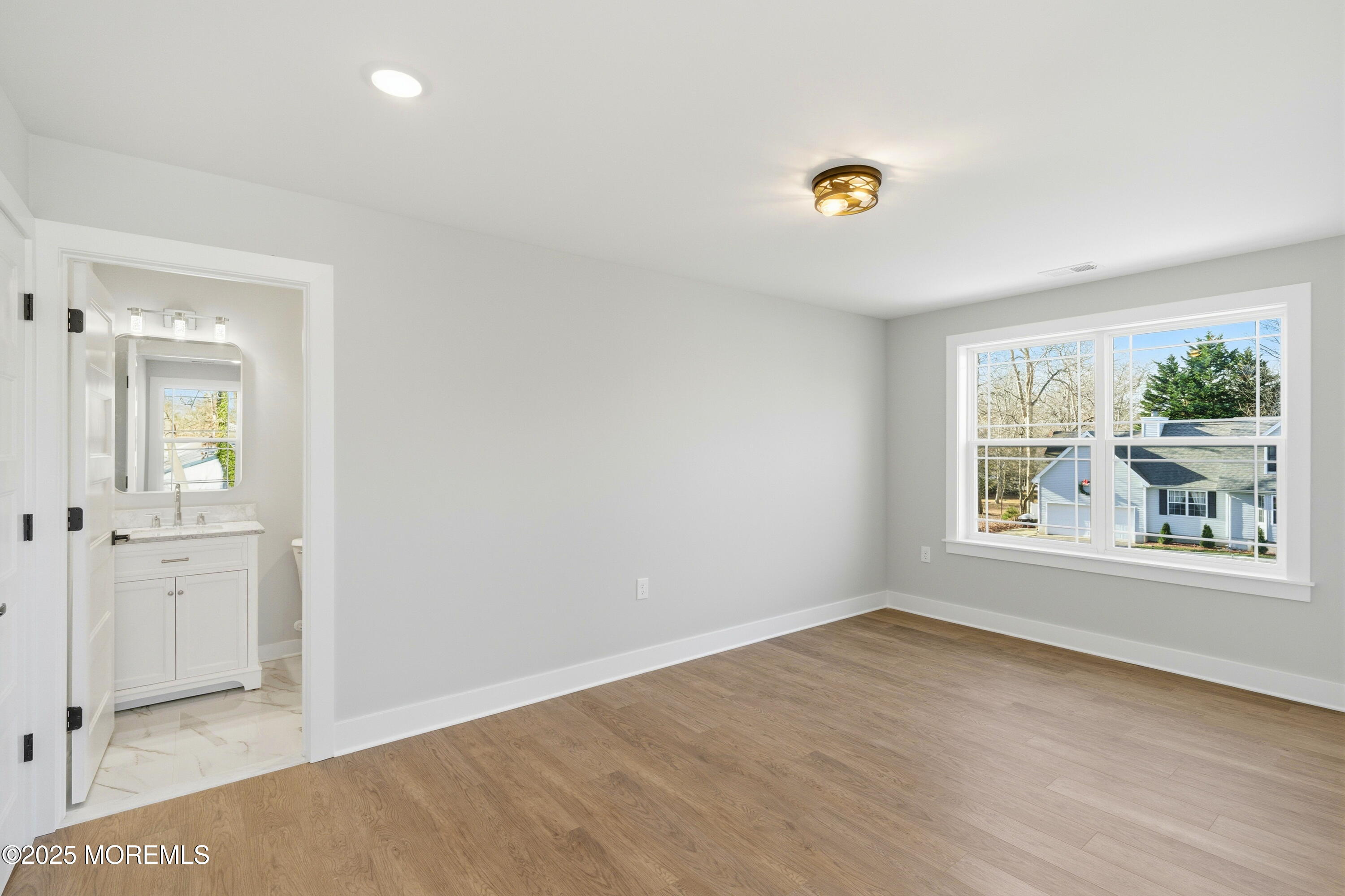 421 Roland Avenue Bayville, NJ 08721 - Photo 26 of 45 an empty room with windows