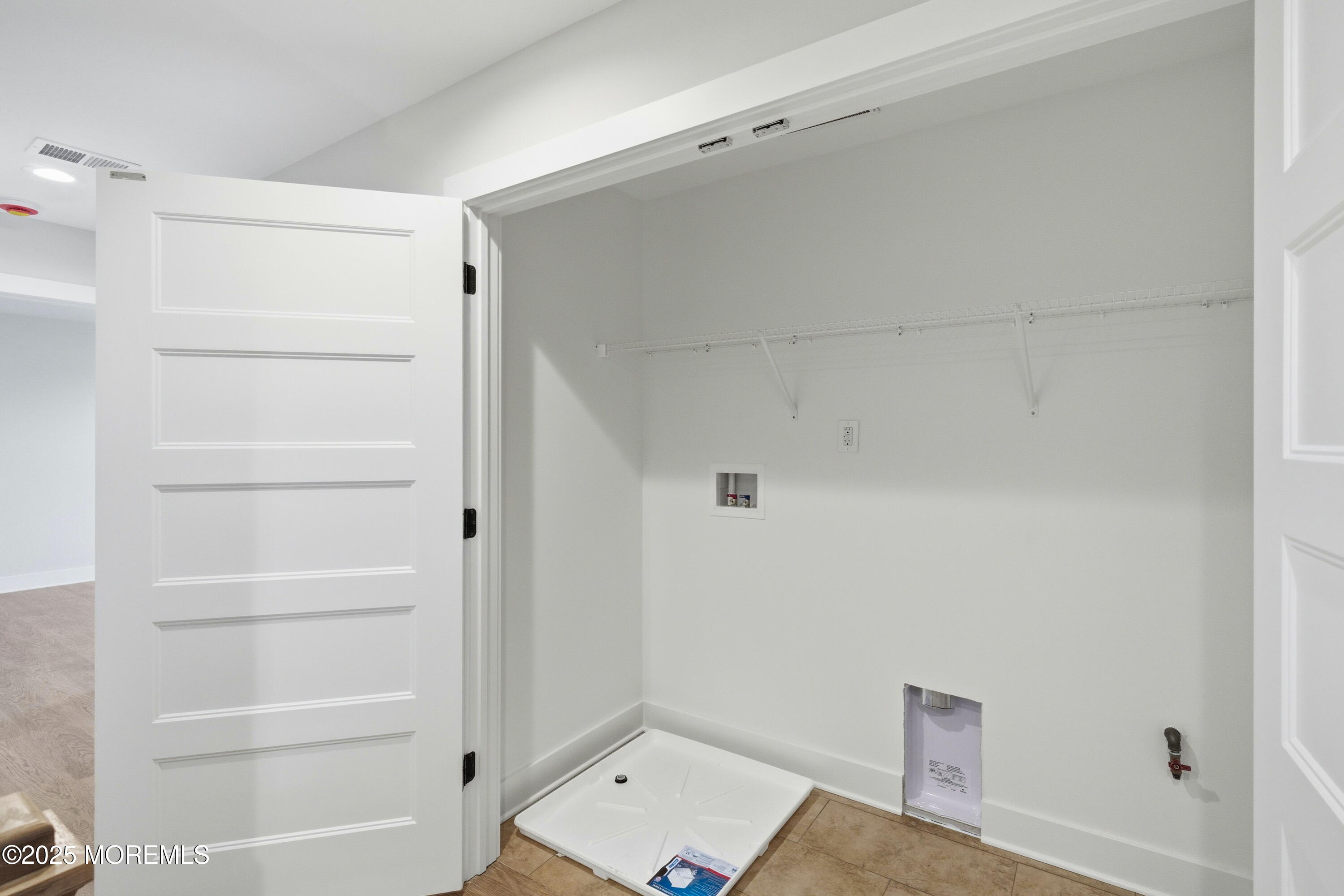 421 Roland Avenue Bayville, NJ 08721 - Photo 30 of 45 a view of an empty walk in closet