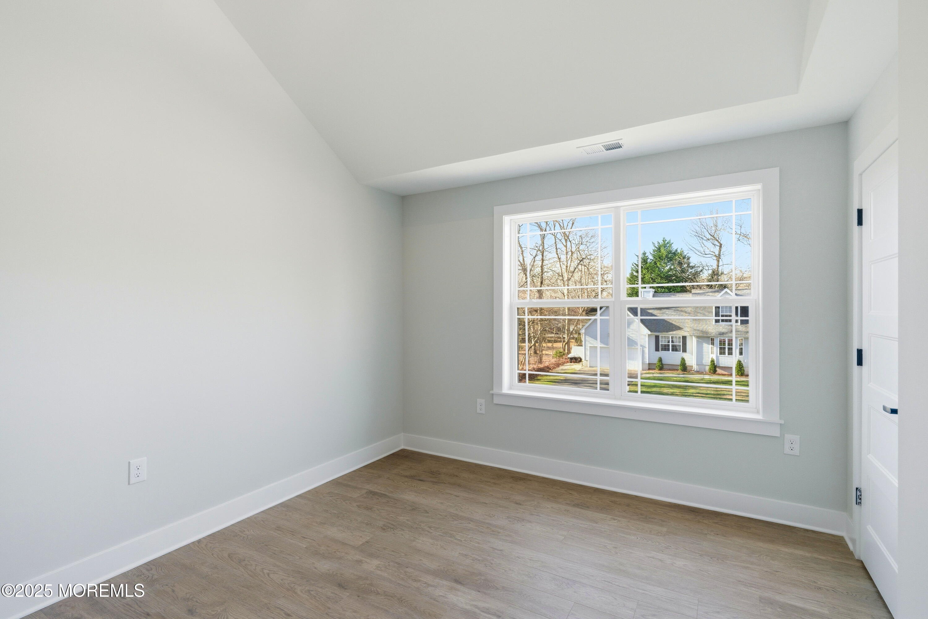 421 Roland Avenue Bayville, NJ 08721 - Photo 32 of 45 an empty room with windows