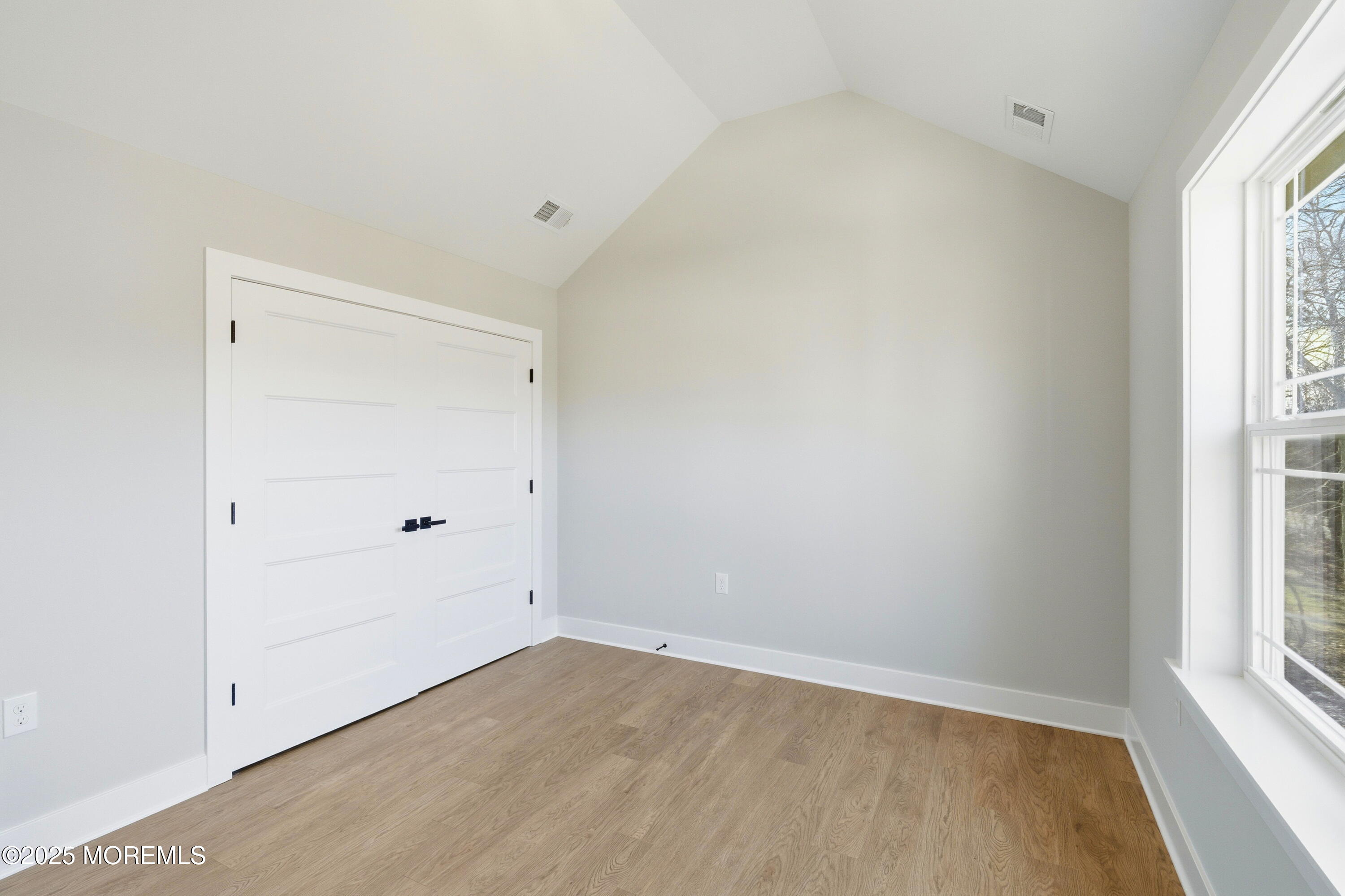 421 Roland Avenue Bayville, NJ 08721 - Photo 34 of 45 a view of an empty room with a window