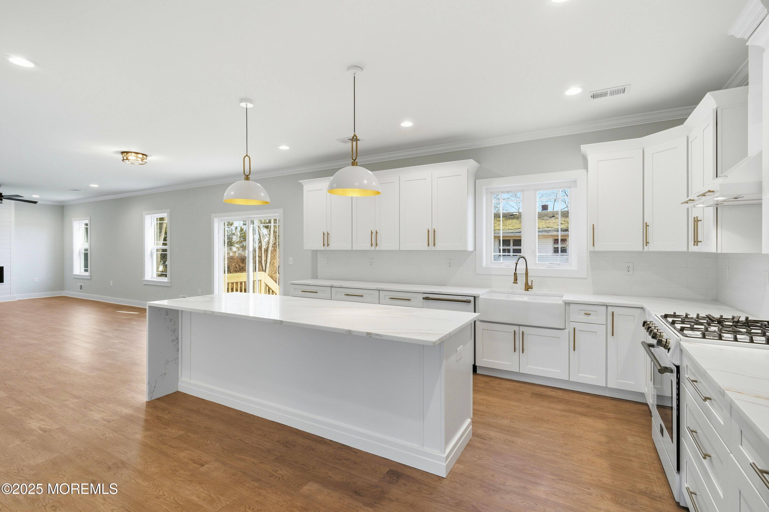 421 Roland Avenue Bayville, NJ 08721 - Photo 37 of 45 a large kitchen with stainless steel appliances lots of counter space and a sink