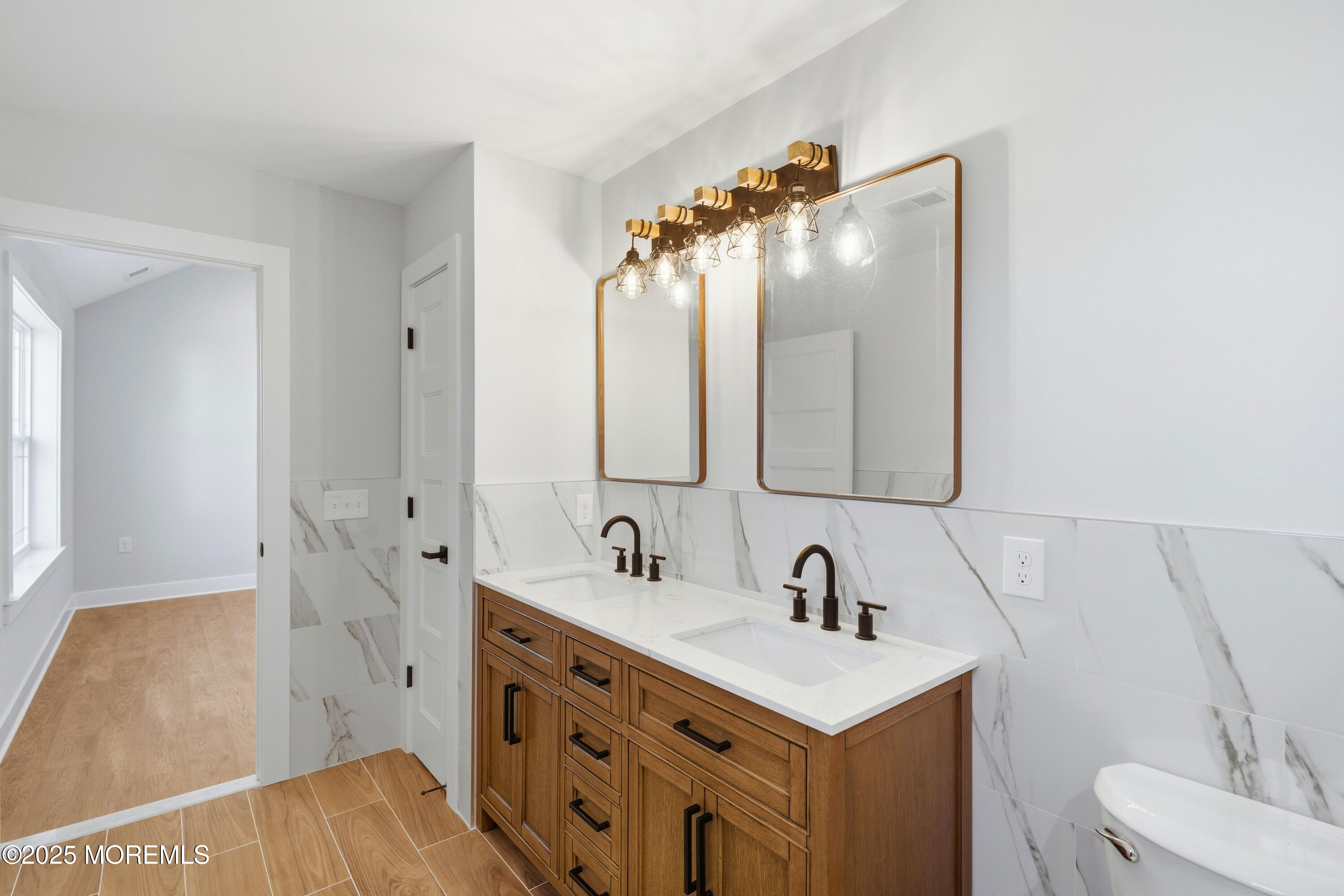 421 Roland Avenue Bayville, NJ 08721 - Photo 39 of 45 a bathroom with a sink vanity toilet and shower